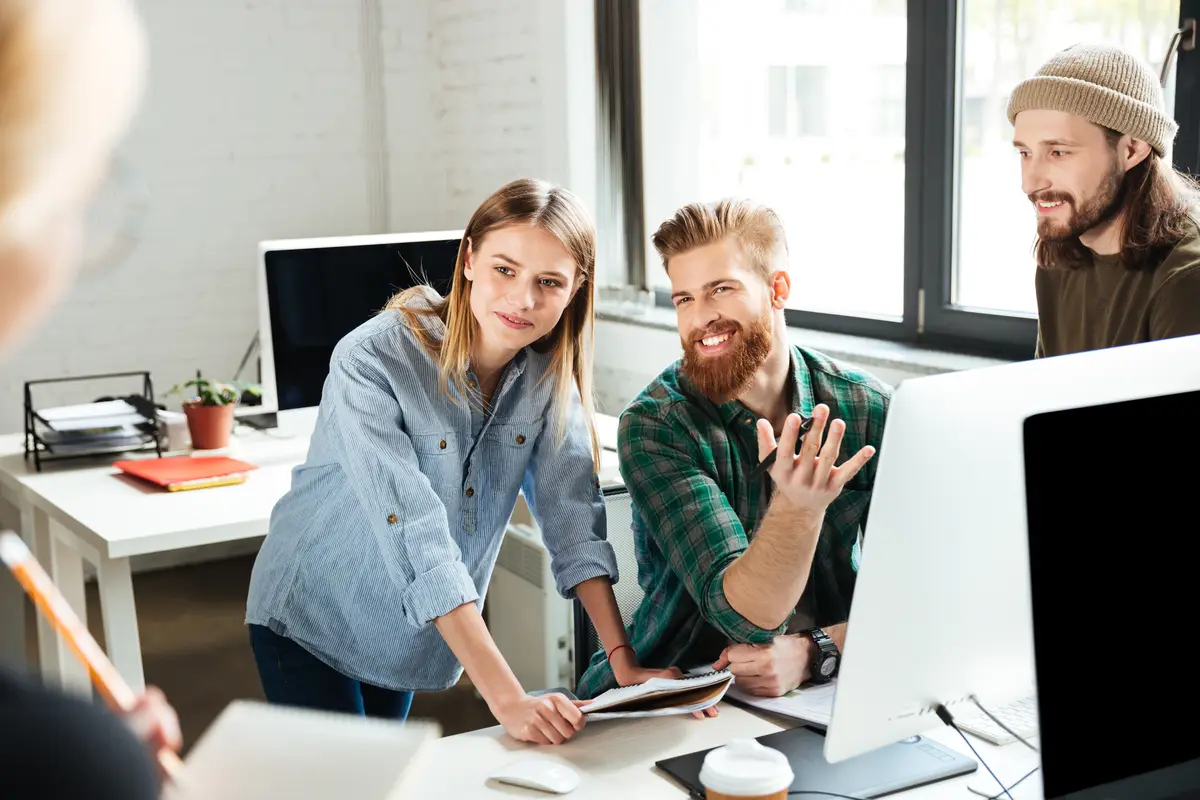 Pixelique Digital team working on a digital marketing campaign